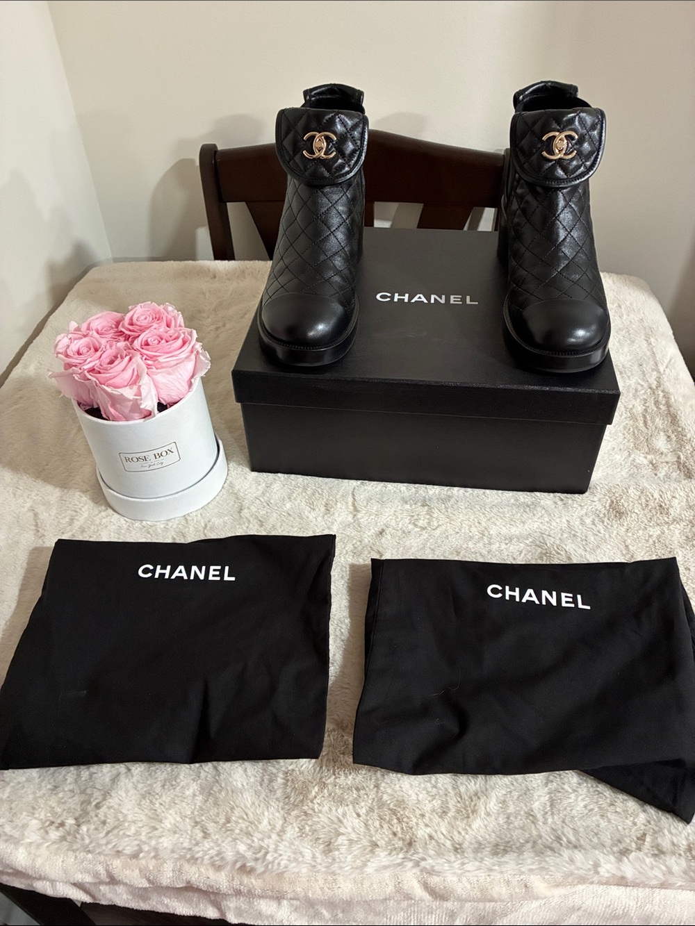 CHANEL Black Quilted Leather Ankle Boots with Gold CC Hardware